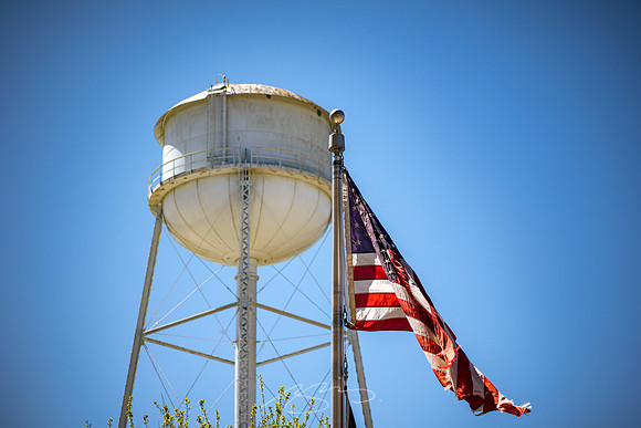 Senoia - March23 - 30 - Flag and Water Tower (Against Blue Sky), Baggardly Way
