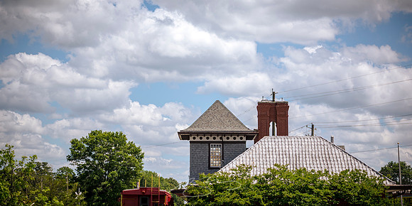 Forsyth - May 2025 - 1 - Forsyth Train Depot (Roof and Sky), 104-114 E. Adams St., Forsyth